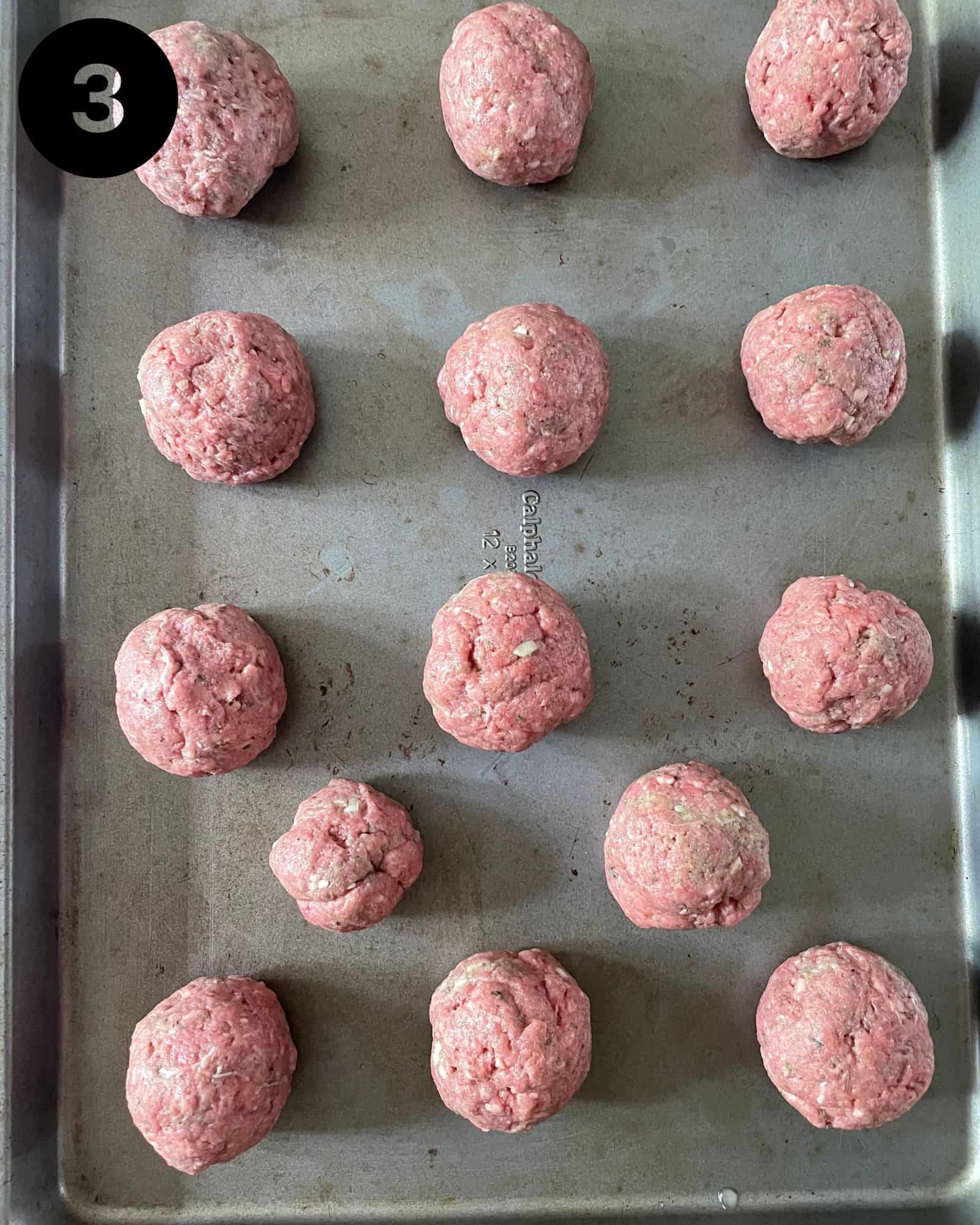 meatballs on a baking sheet.
