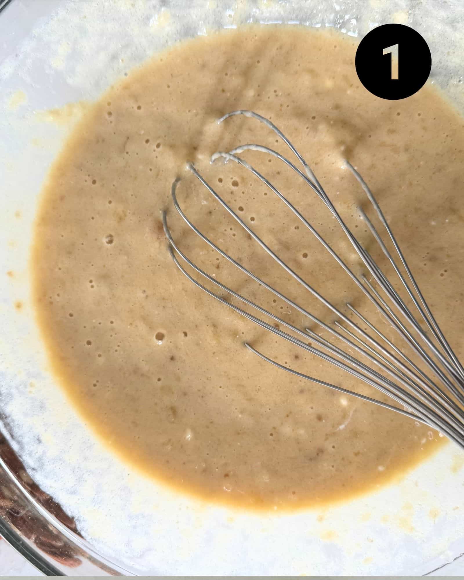 banana bread batter in a large mixing bowl