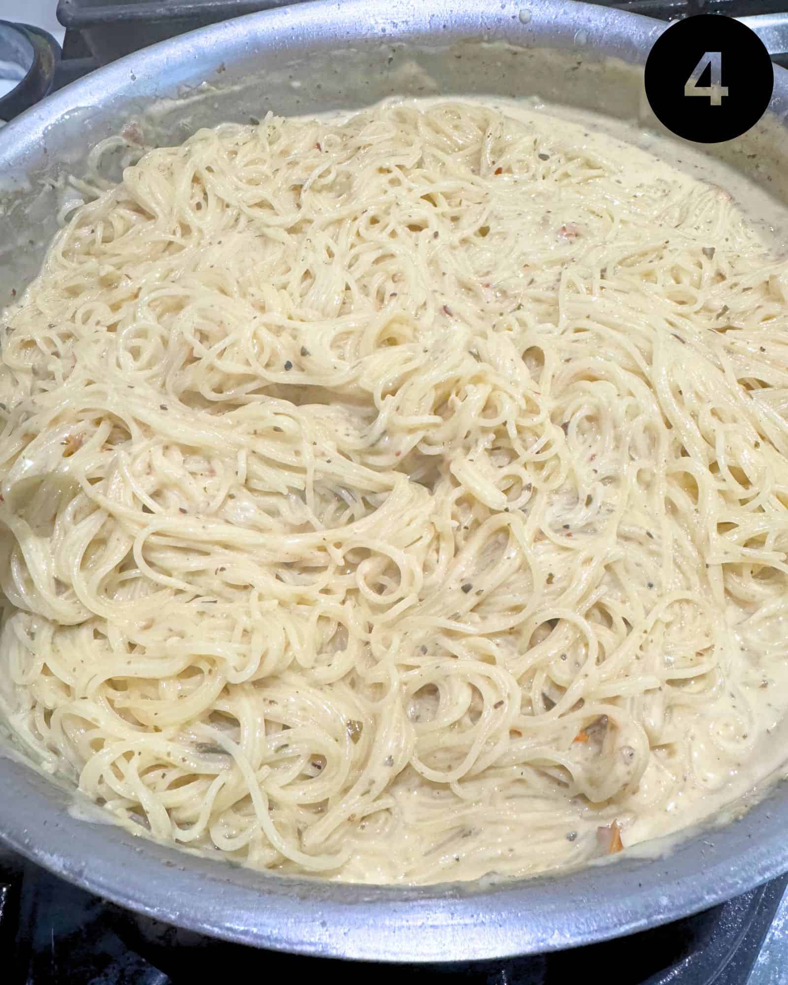 angel hair pasta covered in white wine sauce
