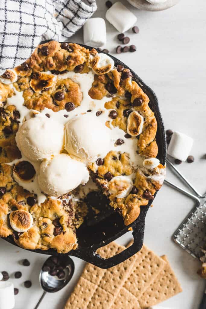 S'mores Stuffed Chocolate Chip Skillet Cookie topped with ice cream