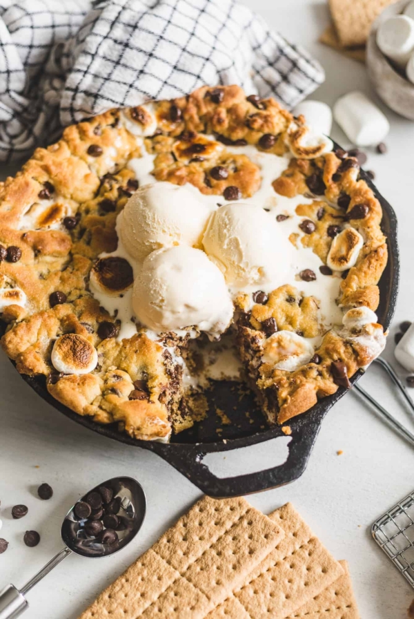 S'mores Stuffed Chocolate Chip Skillet Cookie topped with ice cream