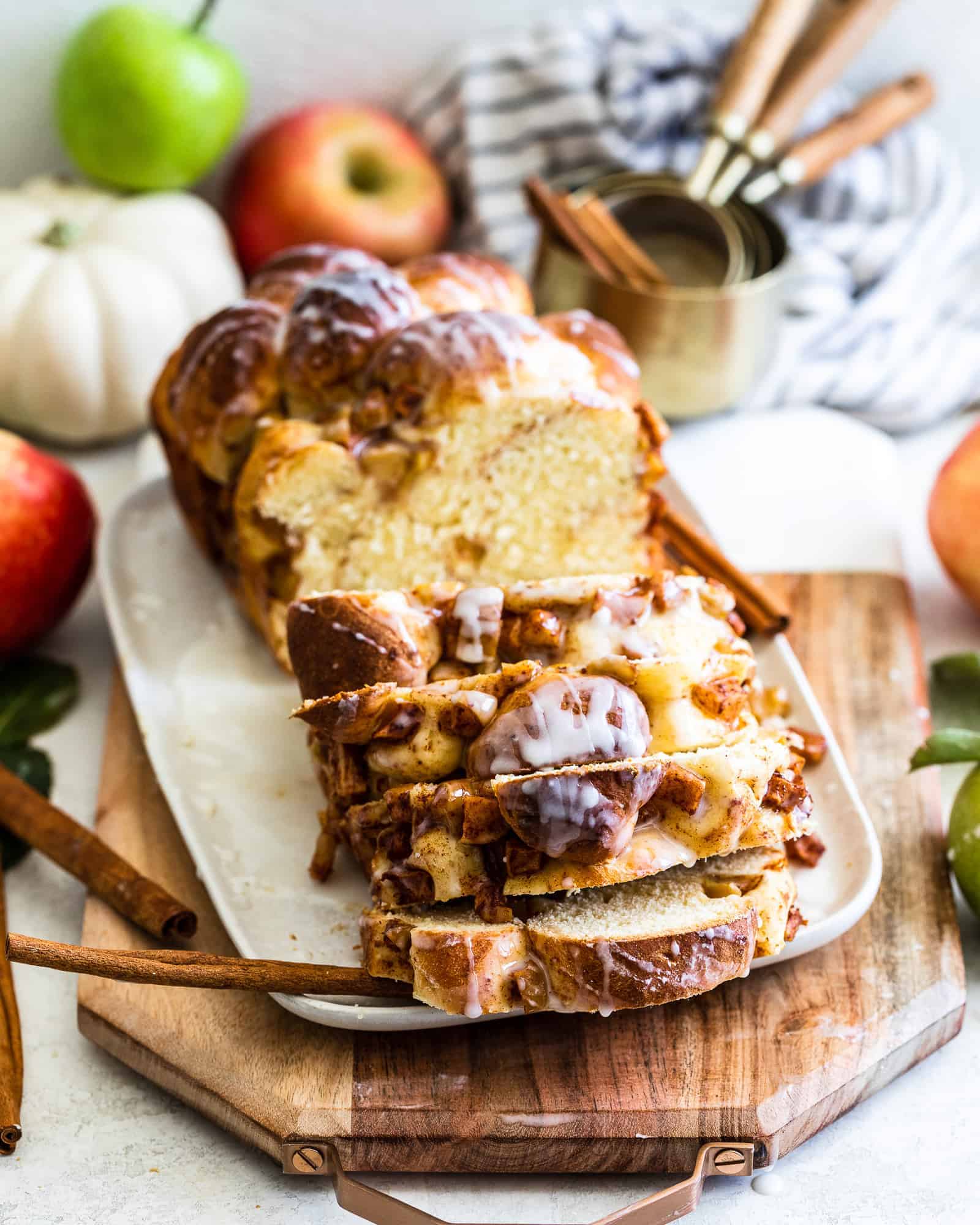 apple and pear bread sliced on a cutting board
