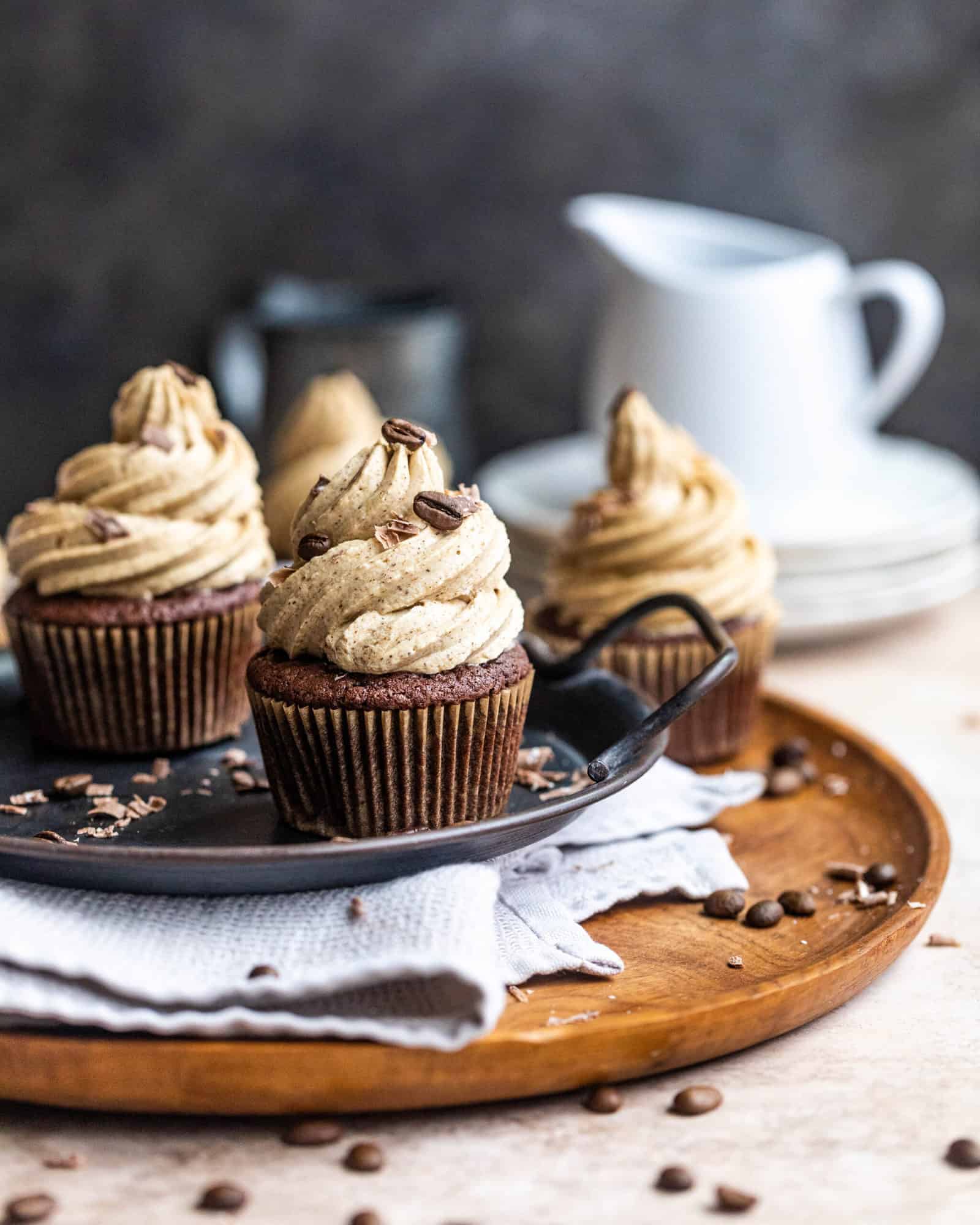 chocolate cupcakes with espresso buttercream on a serving tray