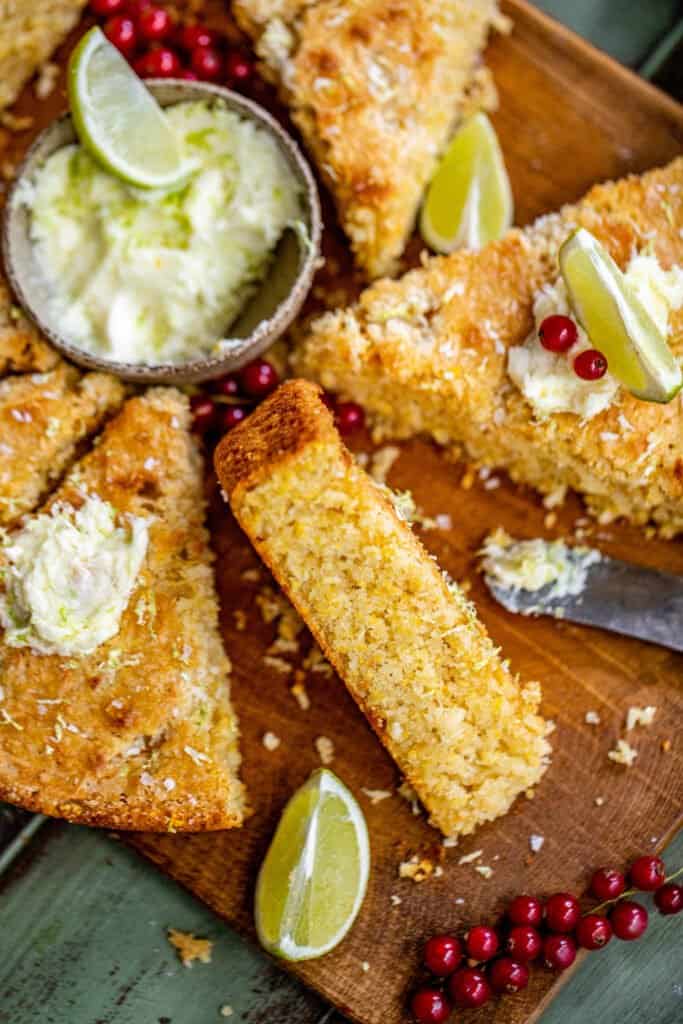 sweet lime butter in a bowl with sliced coconut cornbread