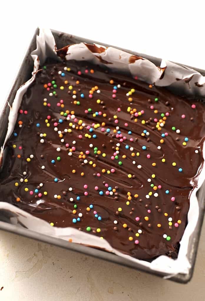 finished cosmic brownies with rainbow crunch sprinkles on top in a 8x8 baking dish