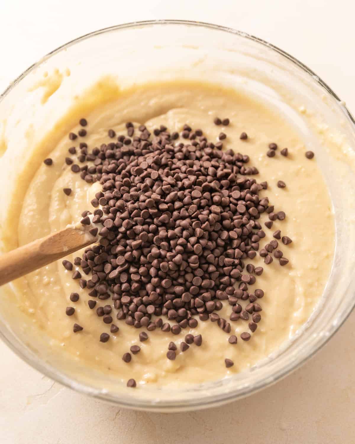 muffin batter in a bowl with chocolate chips