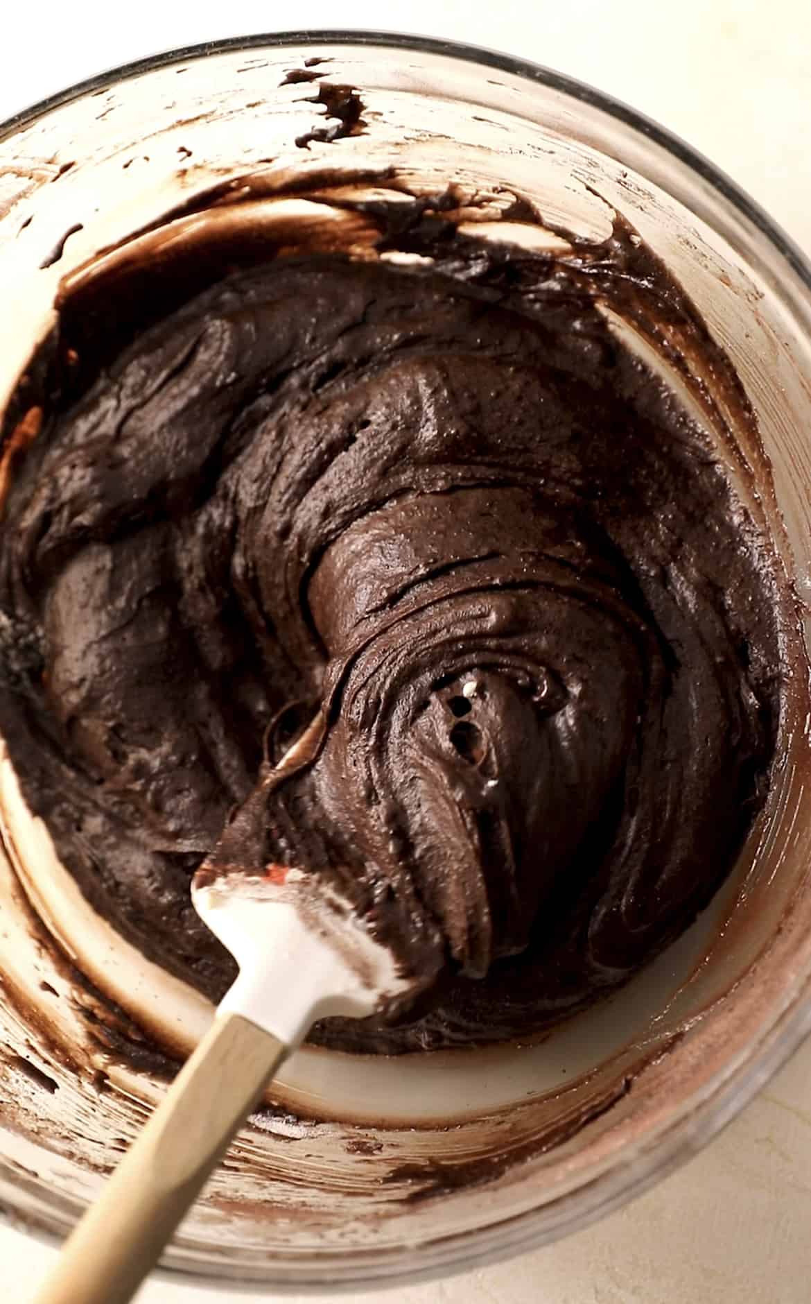 the fully mixed brownies batter in a mixing bowl