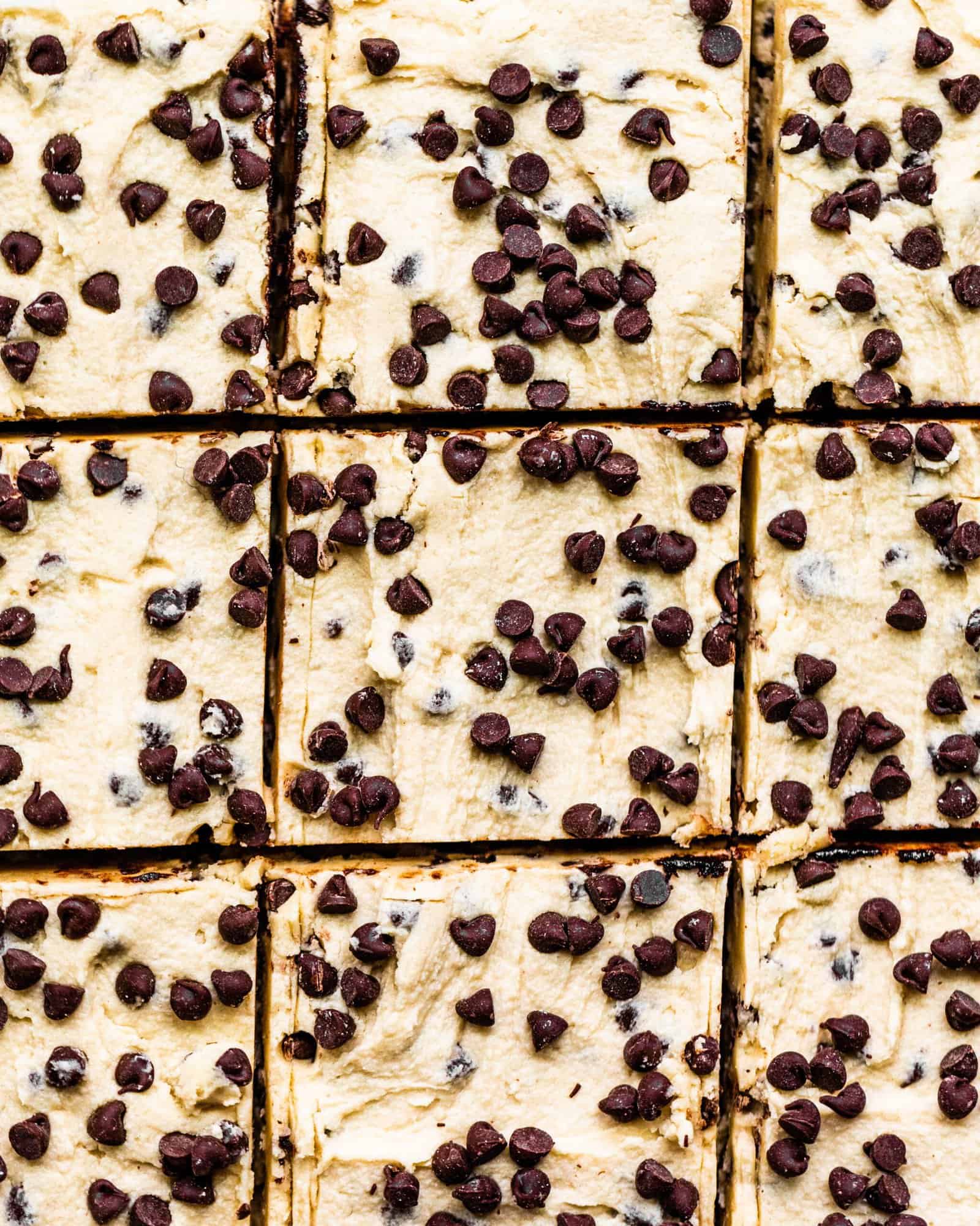 picture of brownies cut into squares with chocolate chips on top