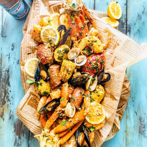 cajun seafood boil recipe in a large bowl with newspaper