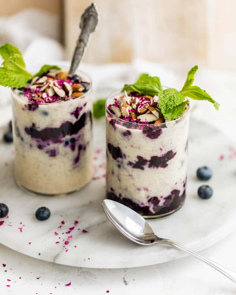 rice pudding in cups with blueberries