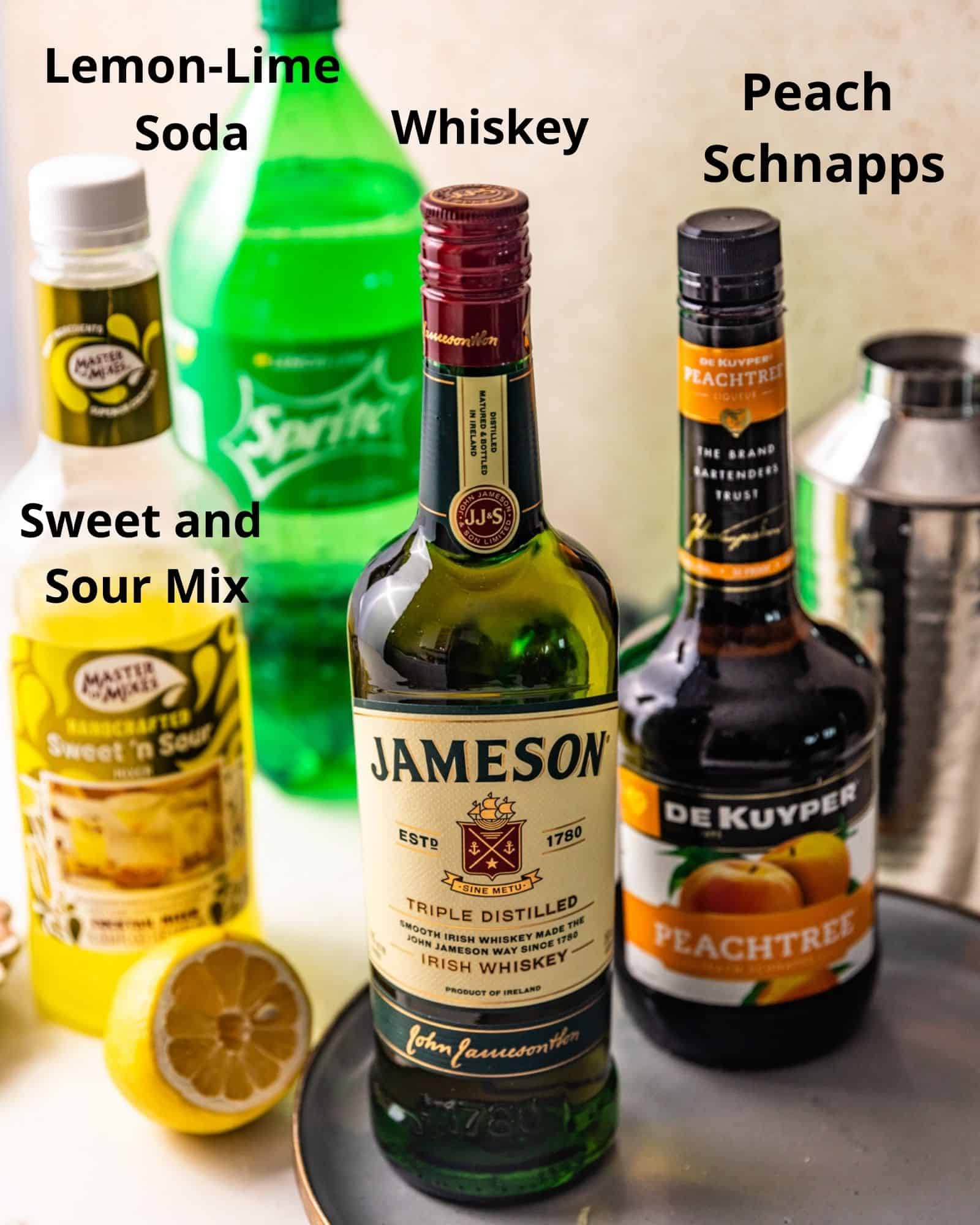 the ingredients used to make green tea shots - whiskey, peach schnapps, lemon lime soda, and sweet and sour mix.