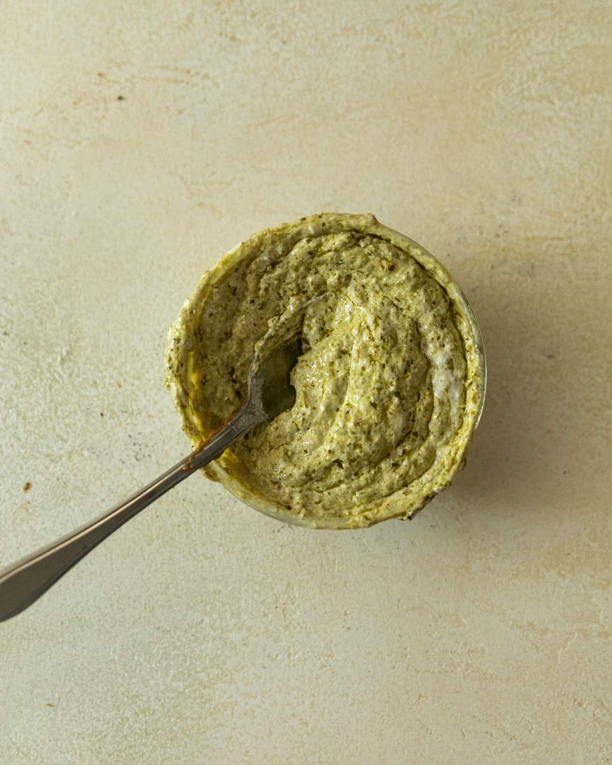 pesto mayo mixed together in a small bowl.