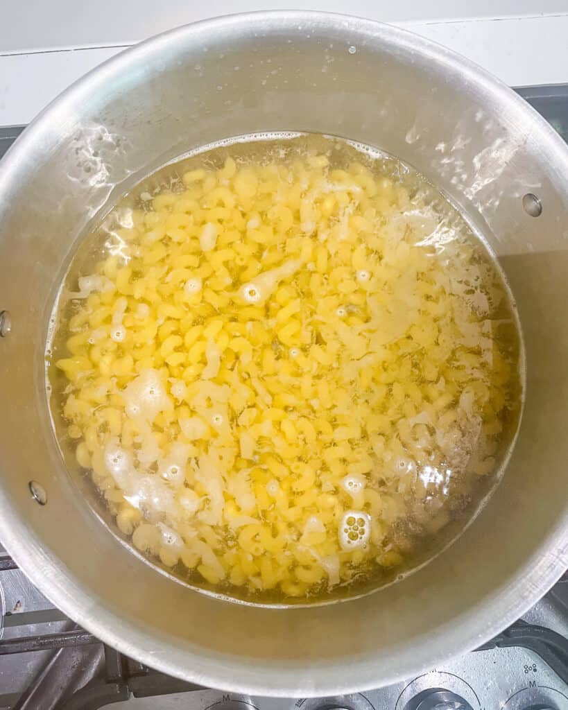 noodles boiling in a pan.