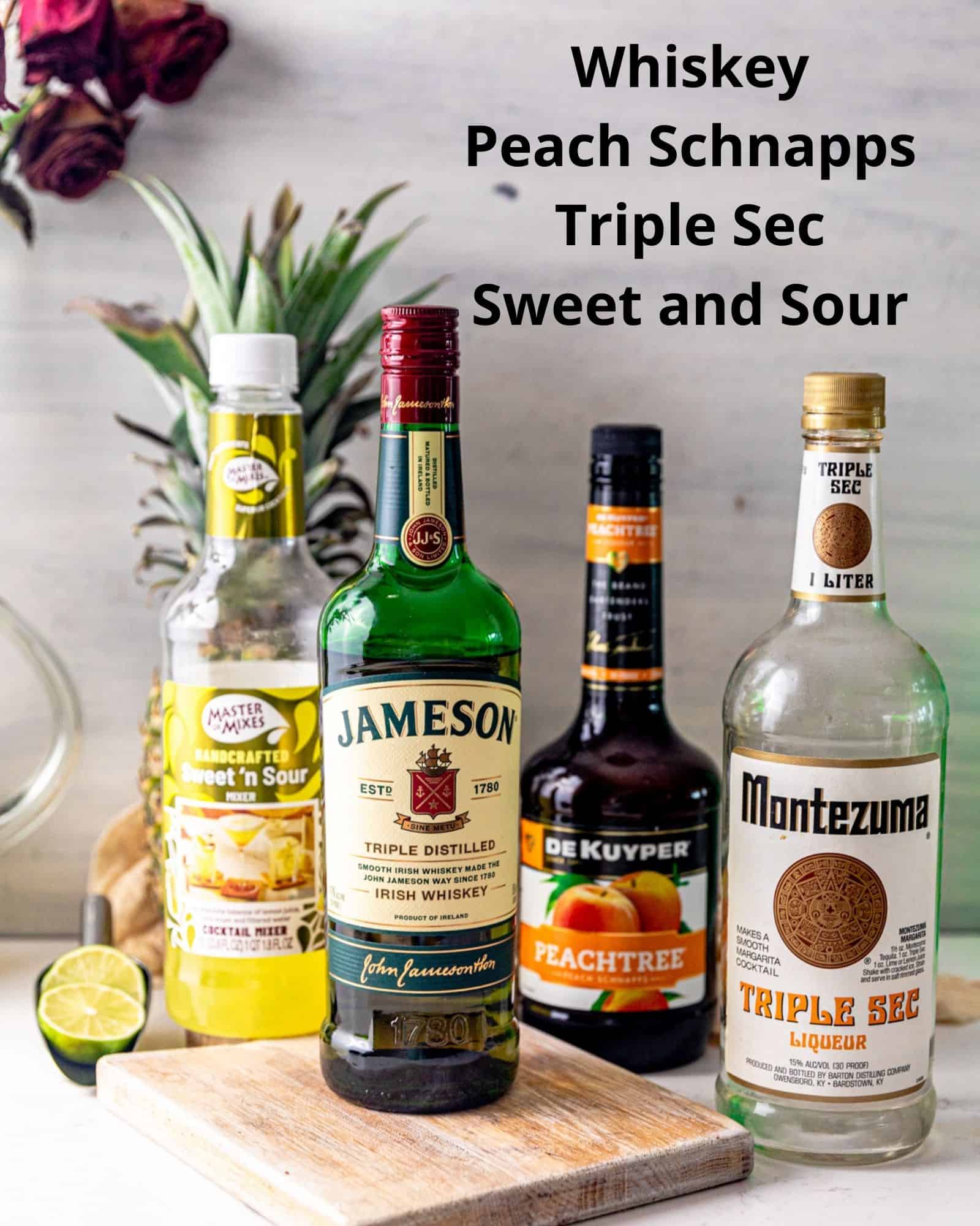 ingredients needed to make water moccasin shot - whiskey, peach schnapps, triple sec, and sweet and sour mix.