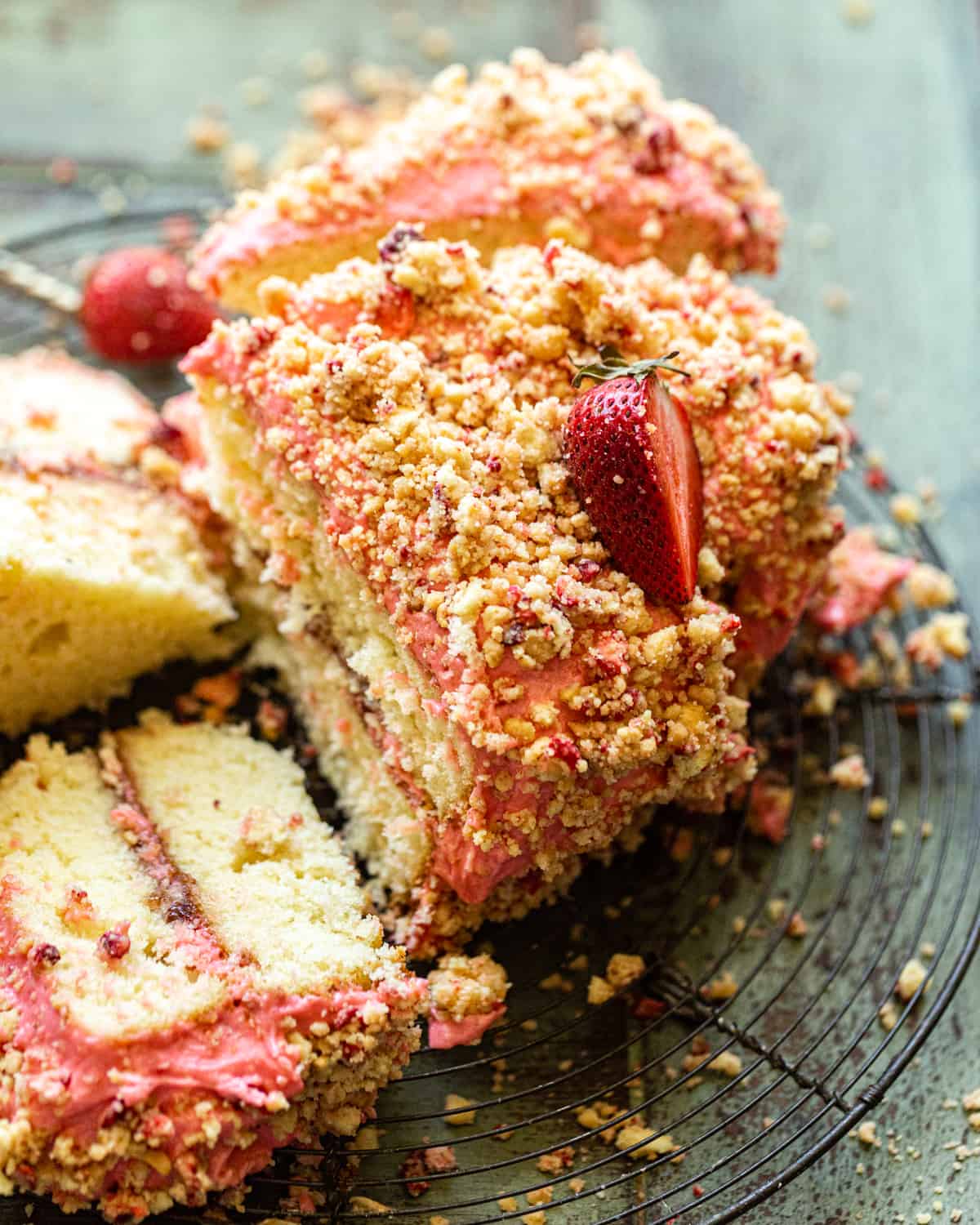 an up close photo of strawberry crunch cake.