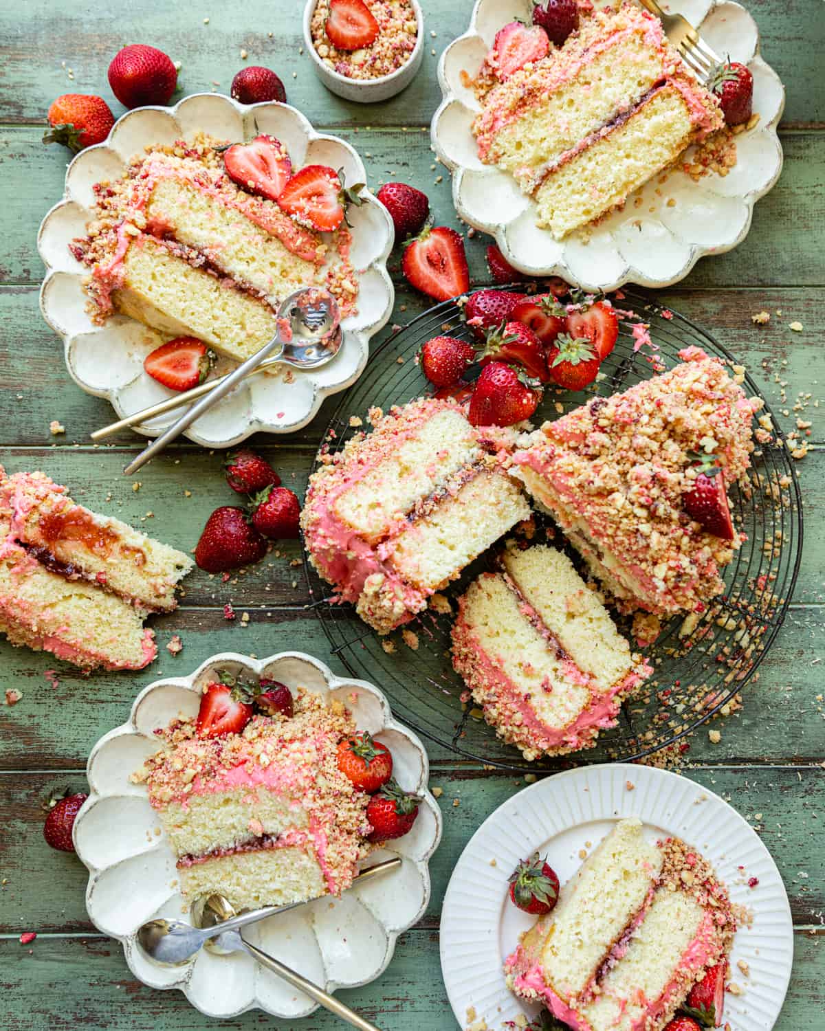slices of strawberry crunch cake on a plate.