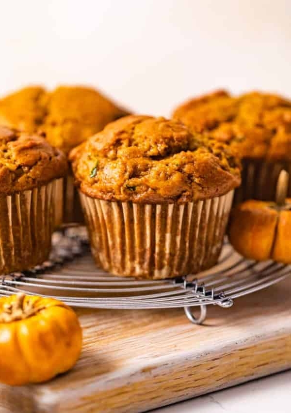 zucchini pumpkin muffins on a serving tray.