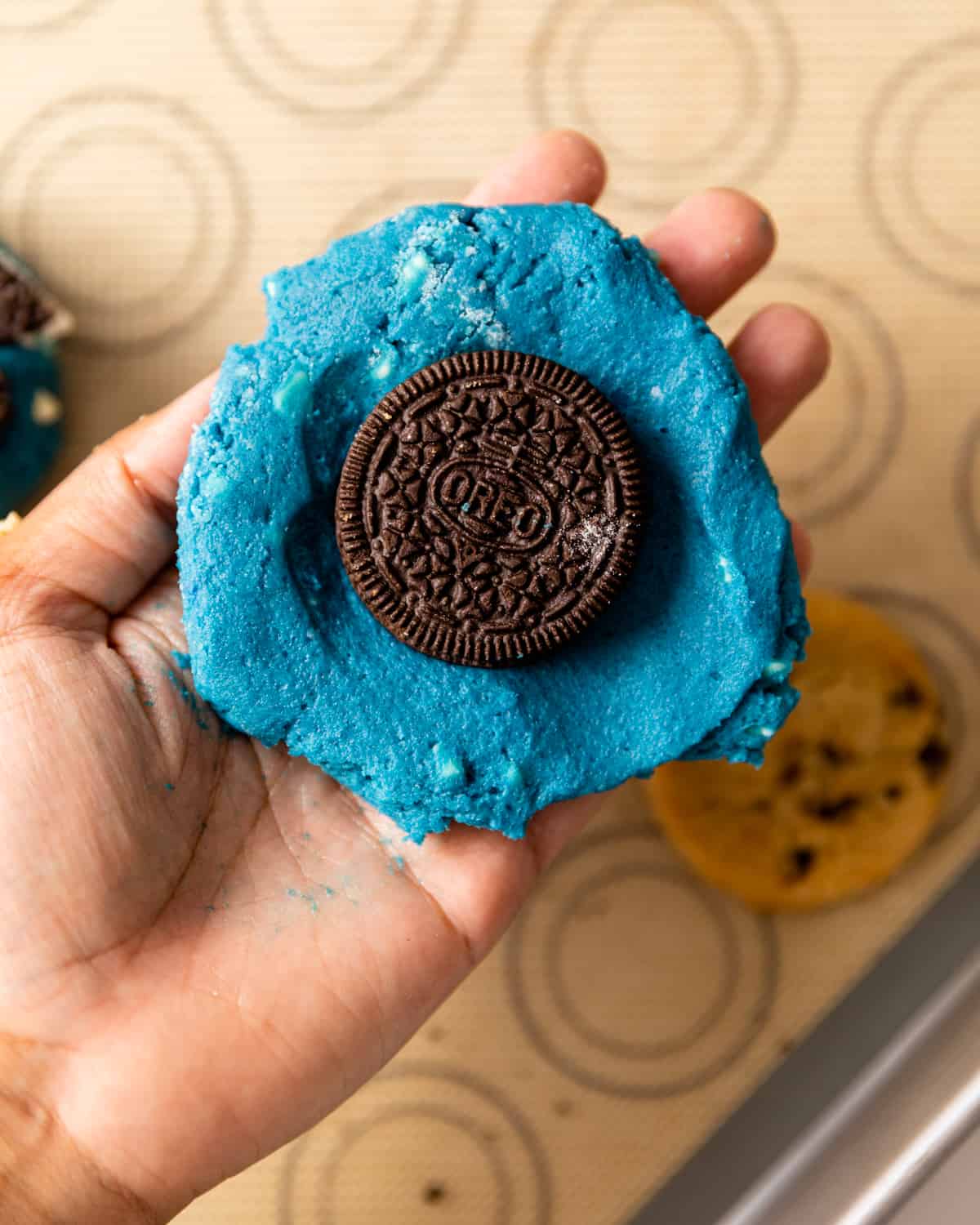 an oreo cookie inside of the cookie dough.