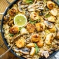 Mushroom Risotto with Scallops in a pan.
