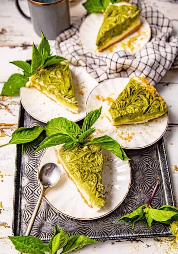 matcha cheesecake slices on plates.