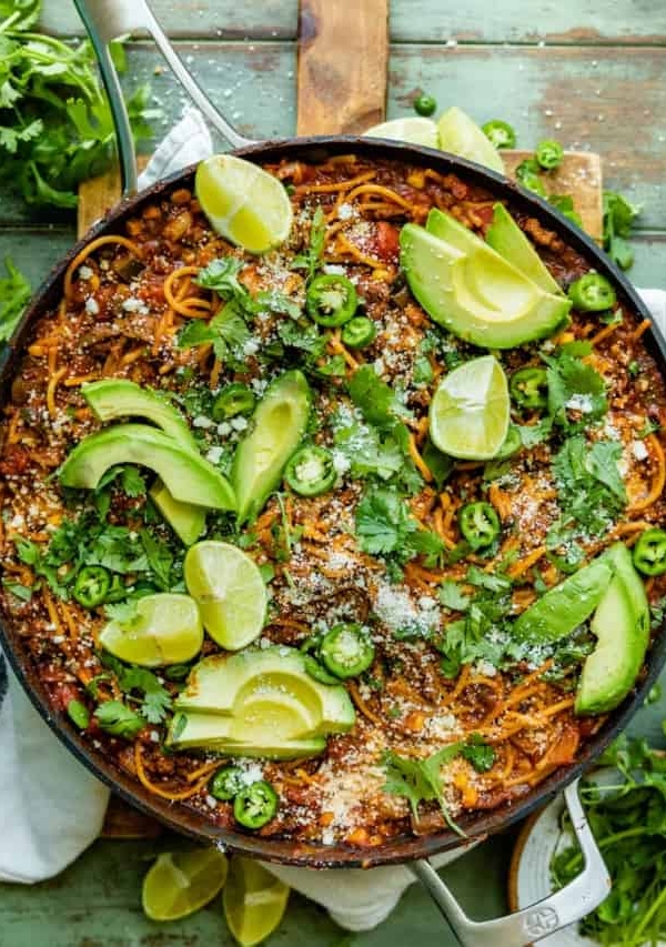 a skillet filled with one pot taco spaghetti.