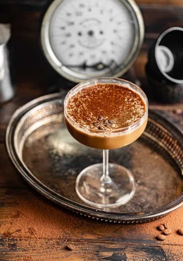 an espresso martini in a couple glass.
