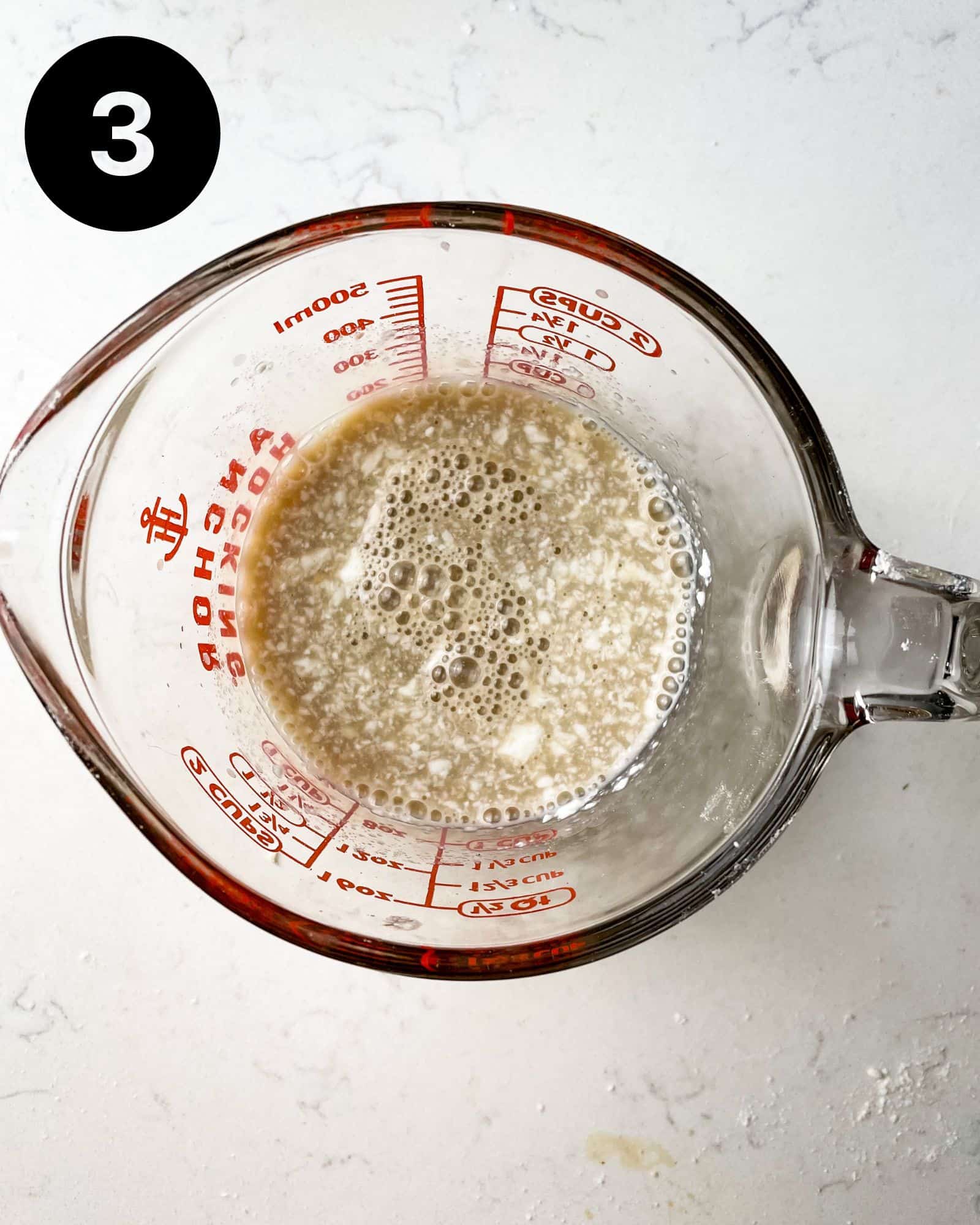 wet ingredients mixed together in a large measuring cup.