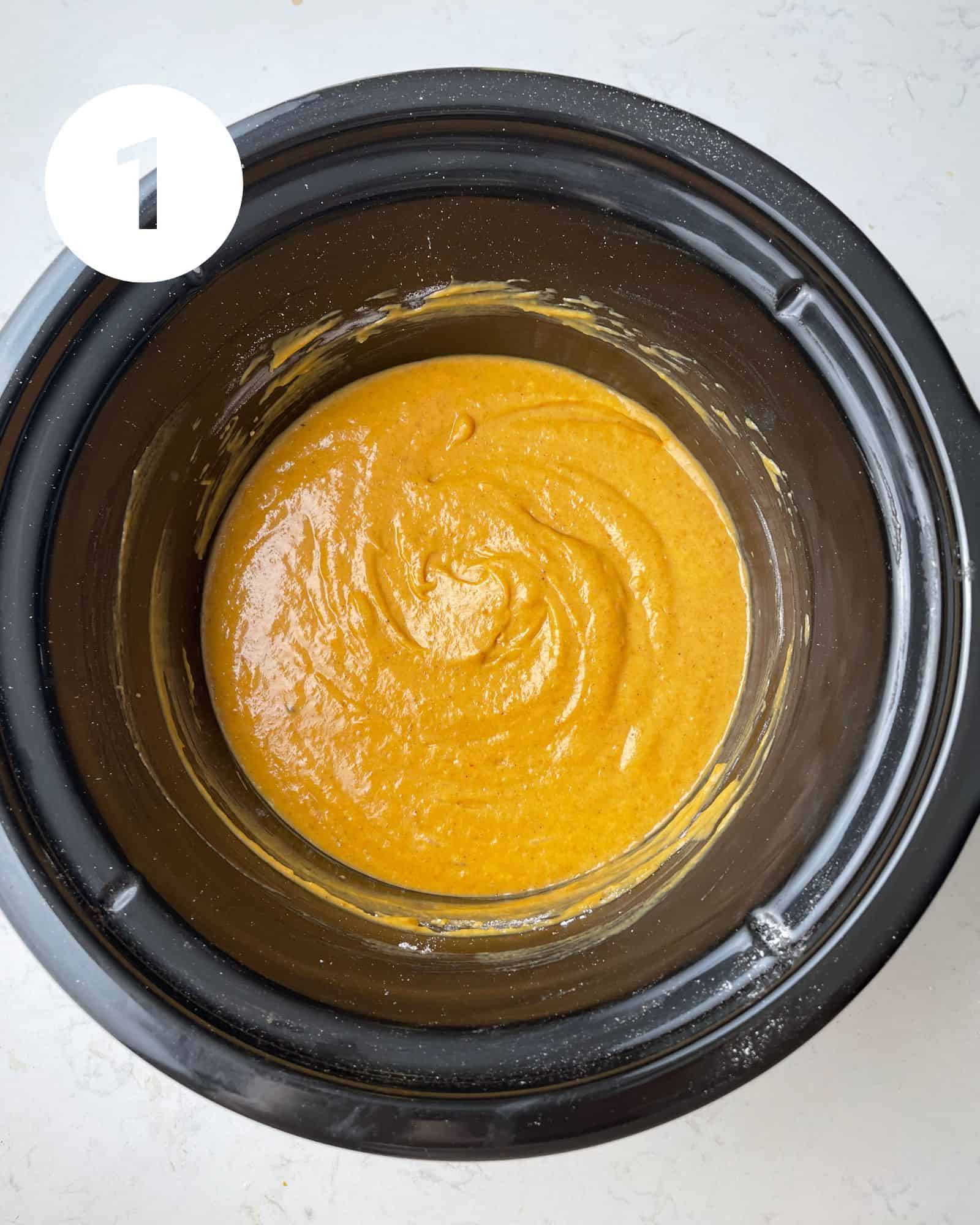 pumpkin cake layer in a slow cooker.