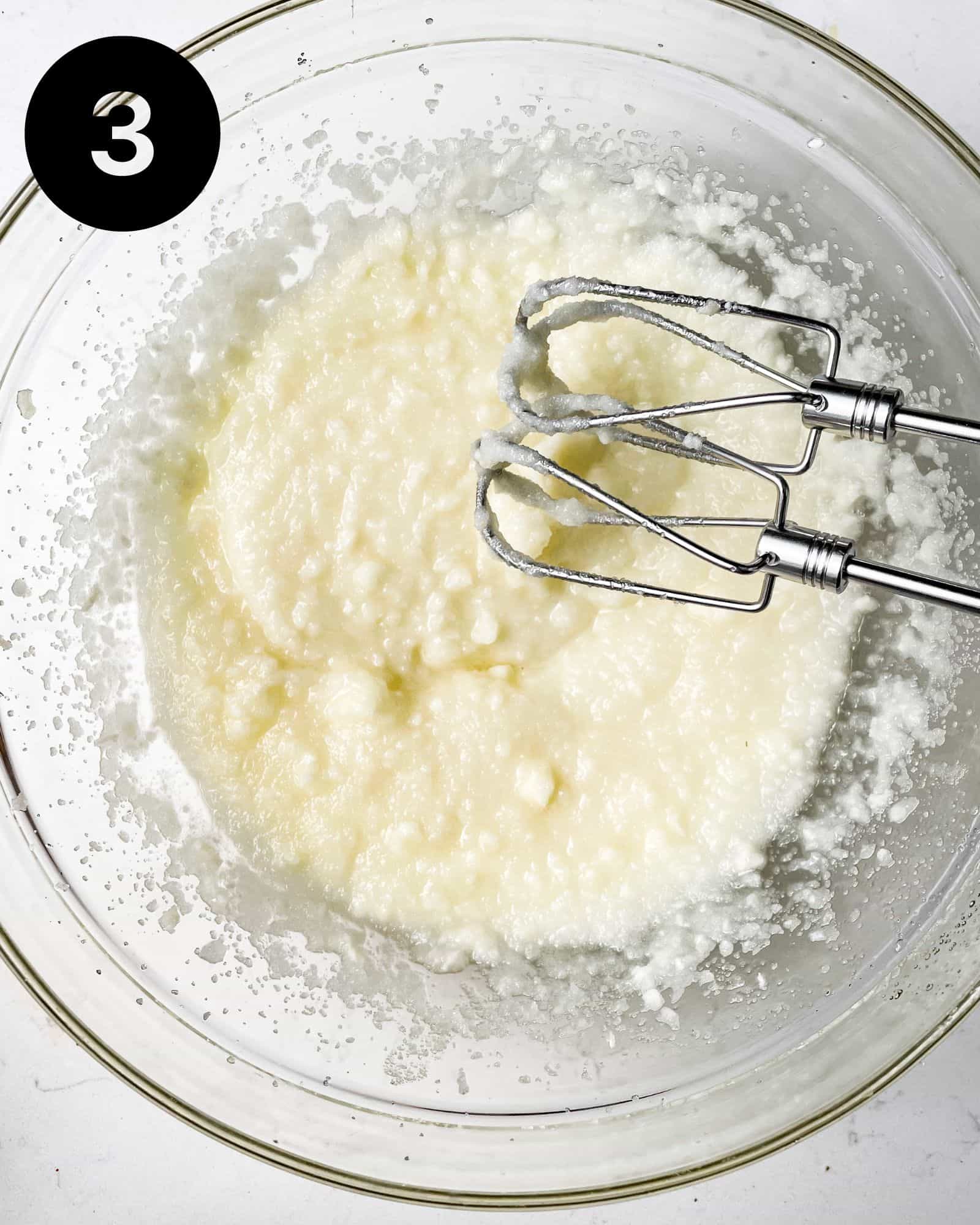 butter, oil, and sugar mixed together in a bowl.
