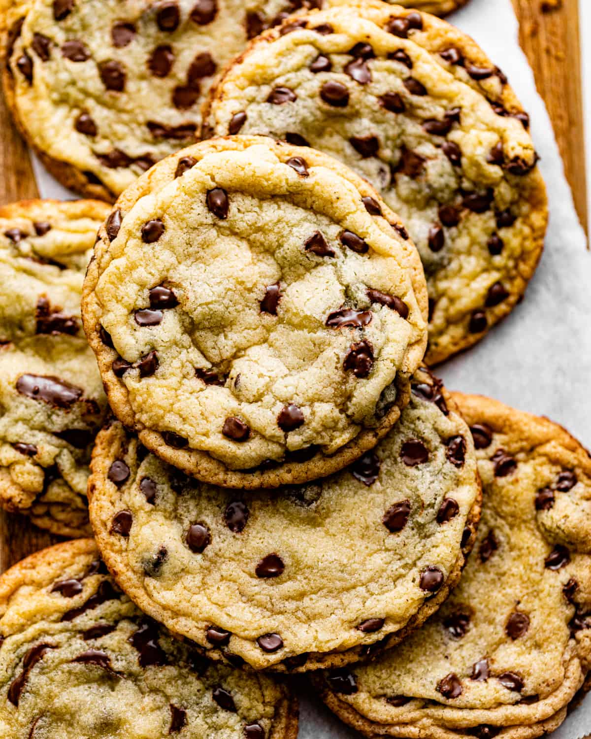 chocolate chip cookies without brown sugar on a wooden board.