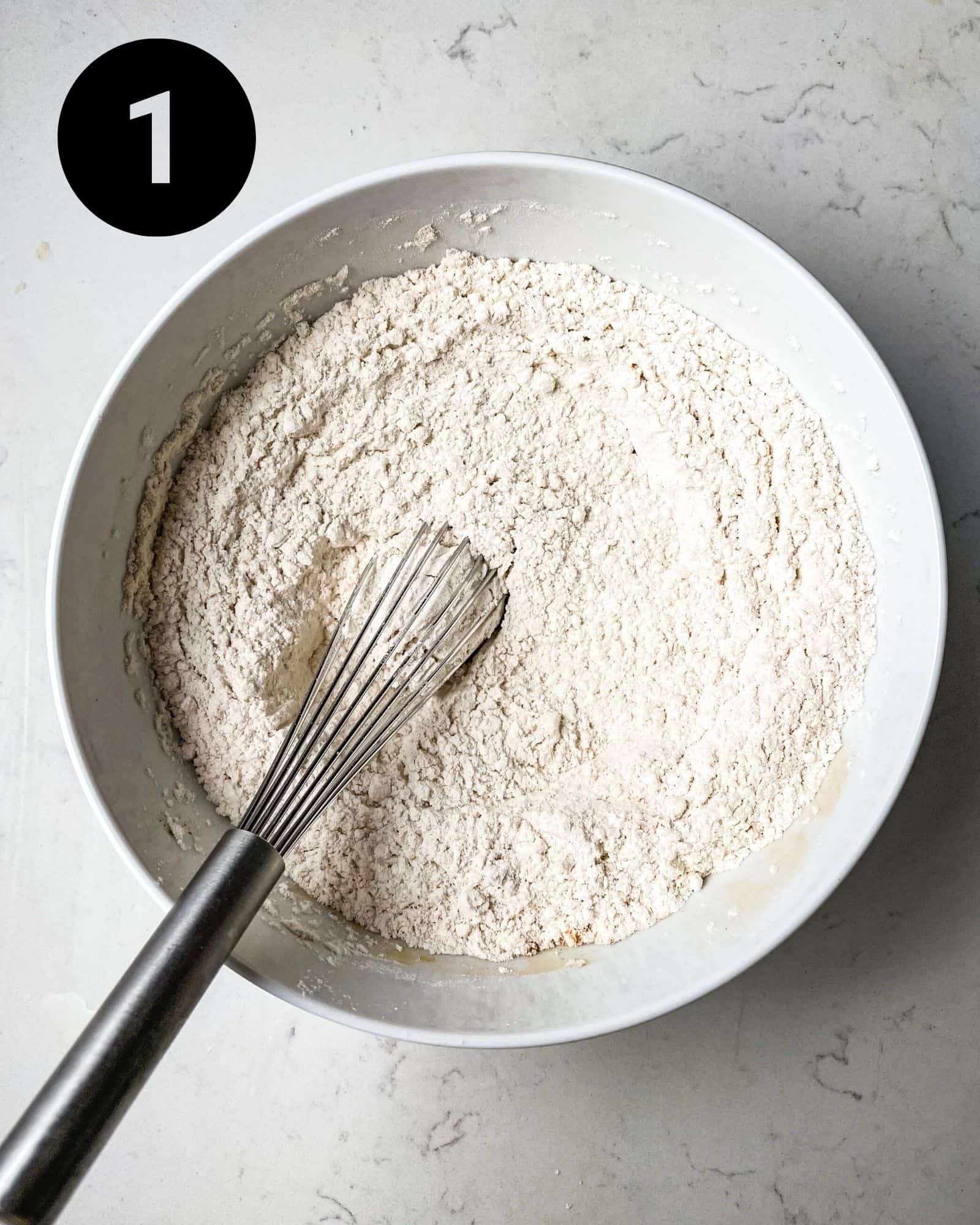 dry ingredients whisked together in a bowl.