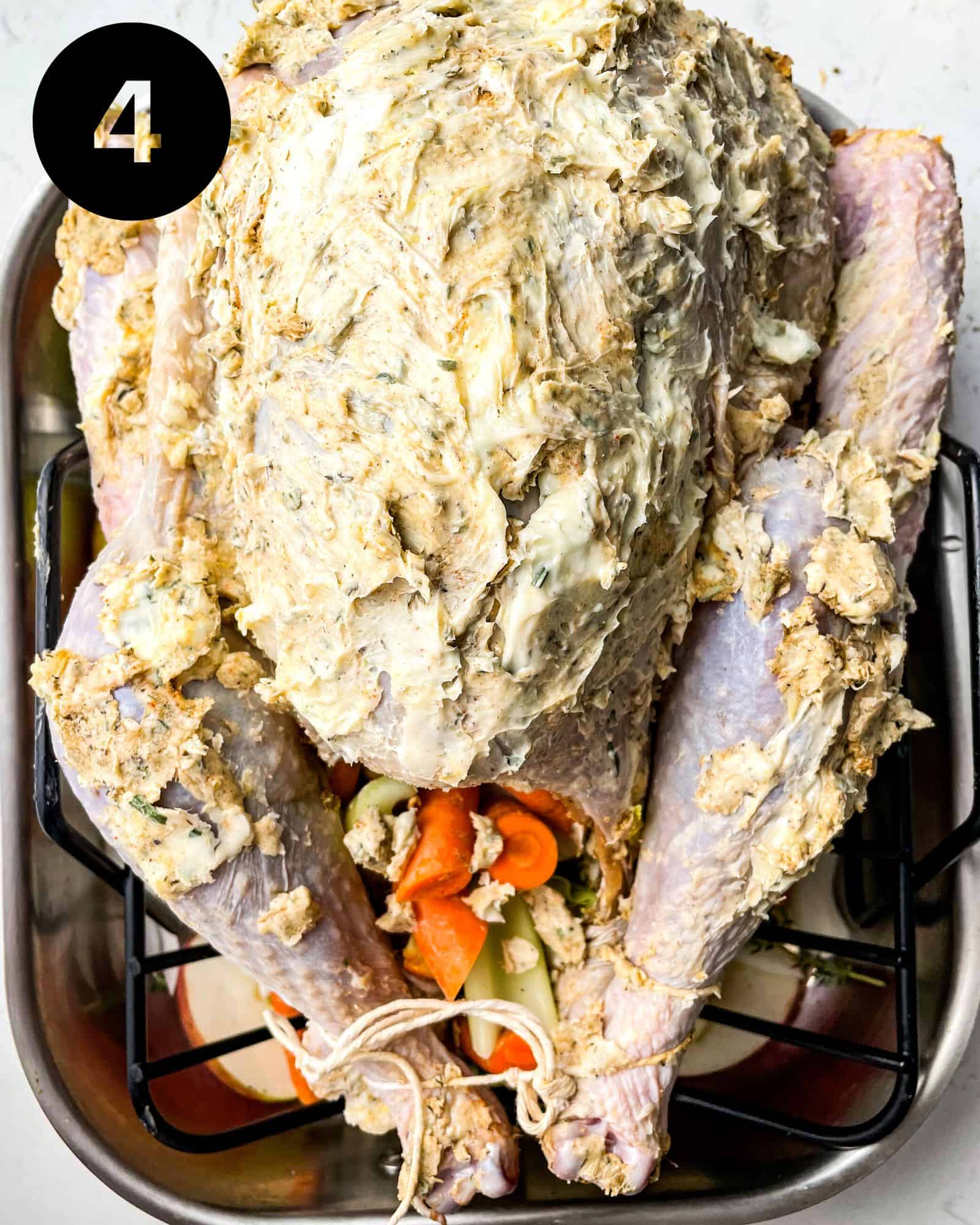 a turkey covered in compound butter.
