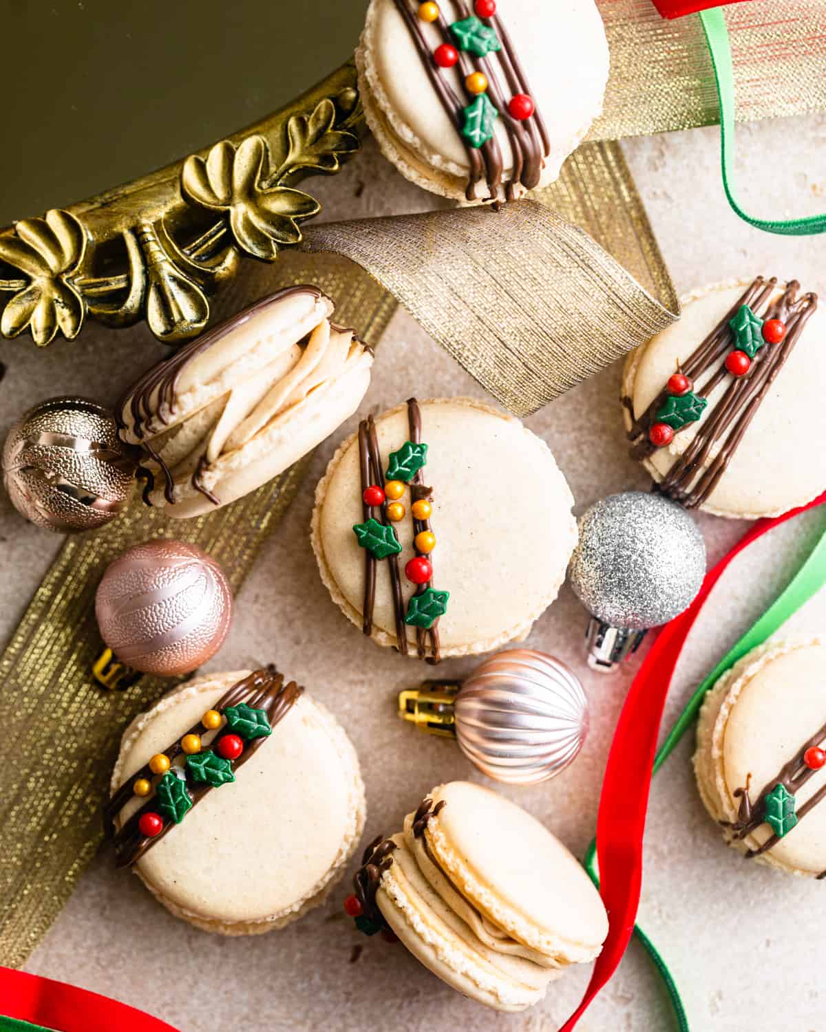gingerbread macarons will christmas sprinkles on top.