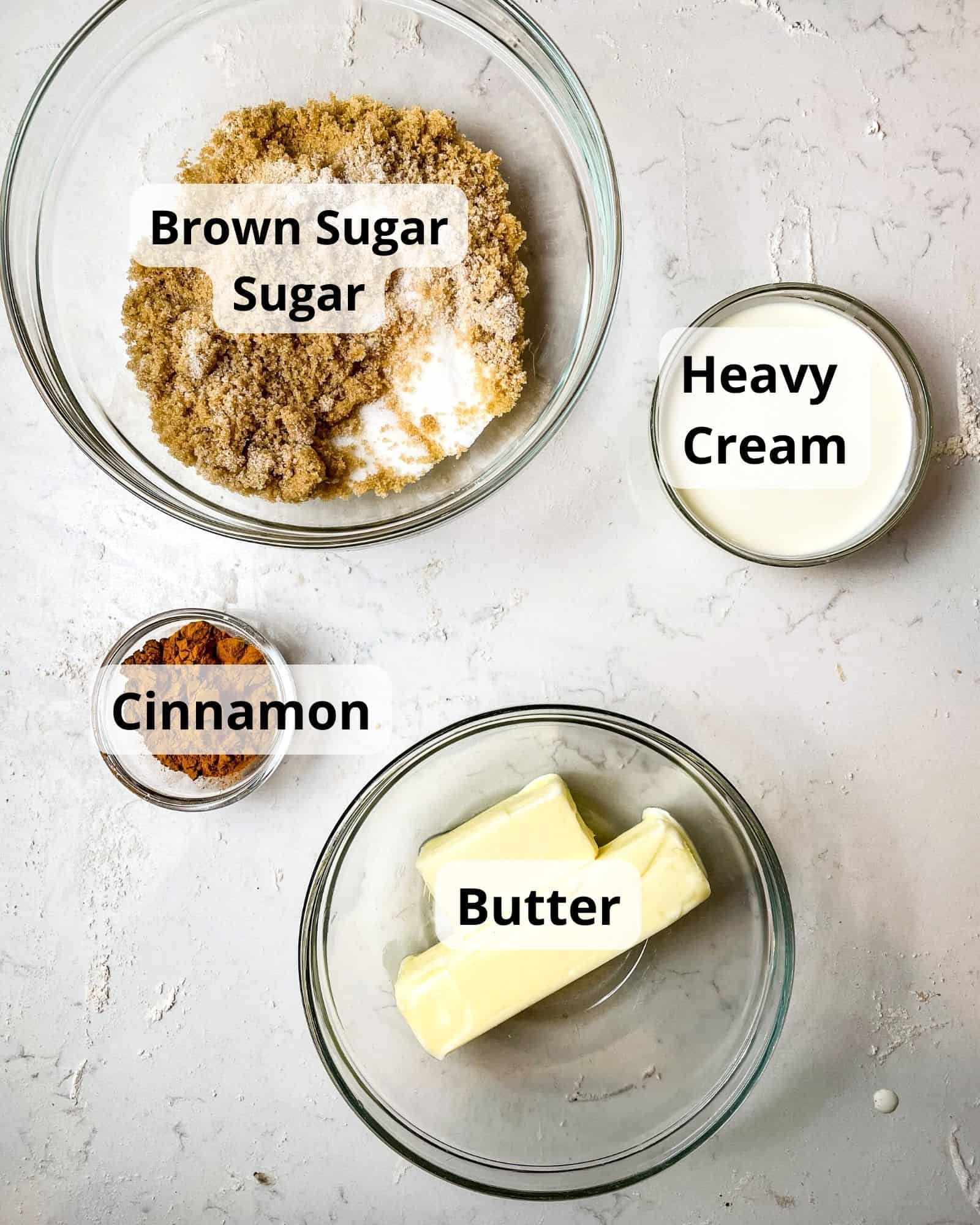 ingredients for the cinnamon roll filling- brown sugar, sugar, cinnamon, butter, and heavy cream.