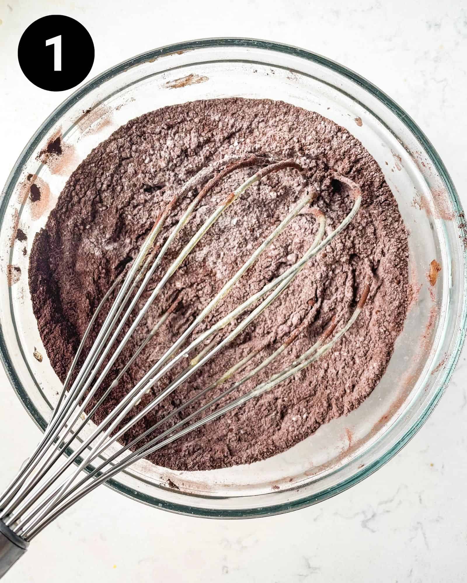 cocoa powder, flour, and salt whisked together in a mixing bowl.