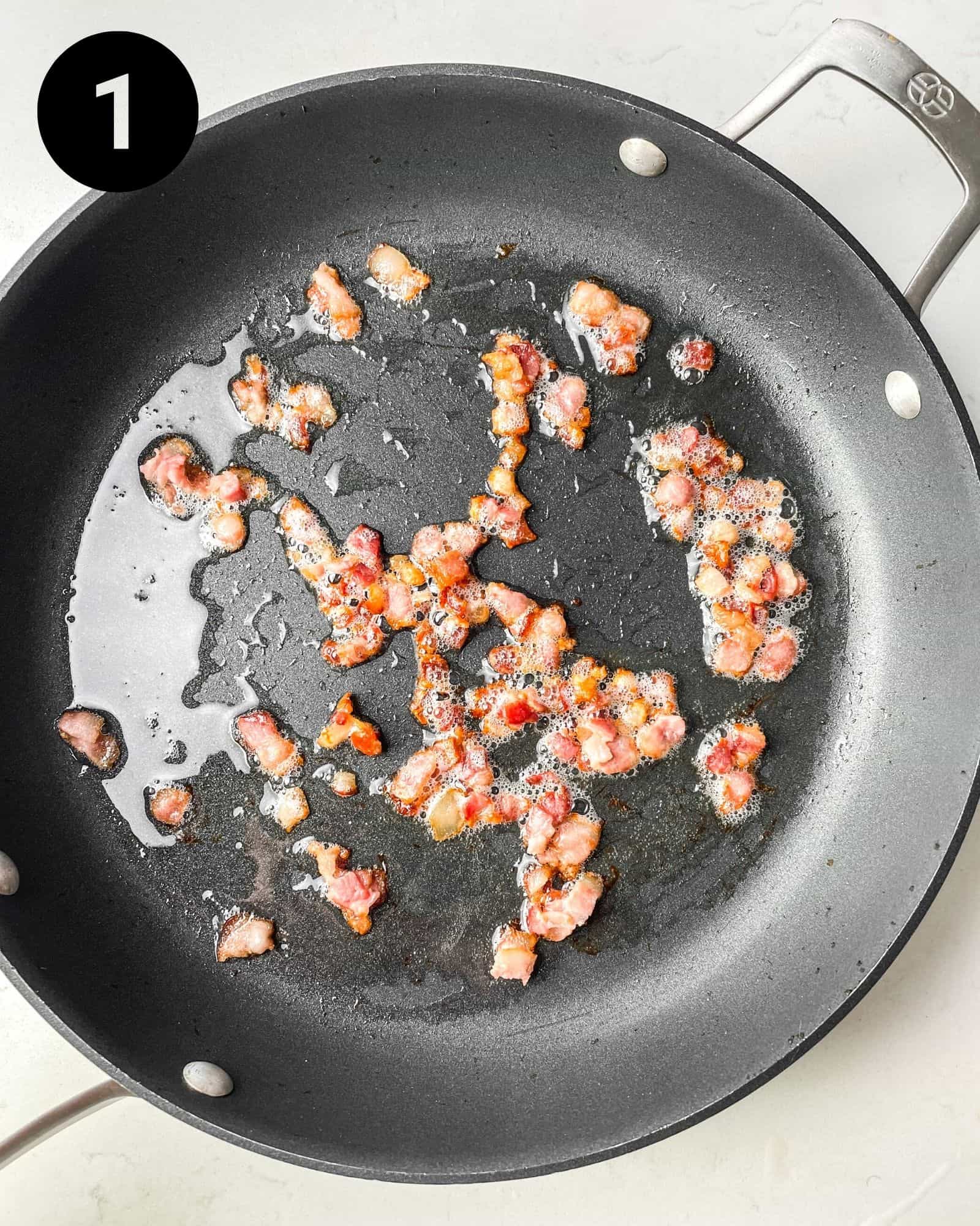diced bacon in a large skillet.