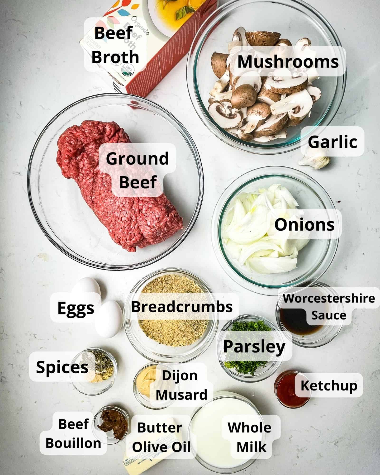 ingredients to make salisbury steak - beef, breadcrumbs, milk, seasonings, garlic, onions, ketchup, worcestershire sauce, parsley, eggs, dijon mustard, thyme, beef broth, flour, and better than bouillon.