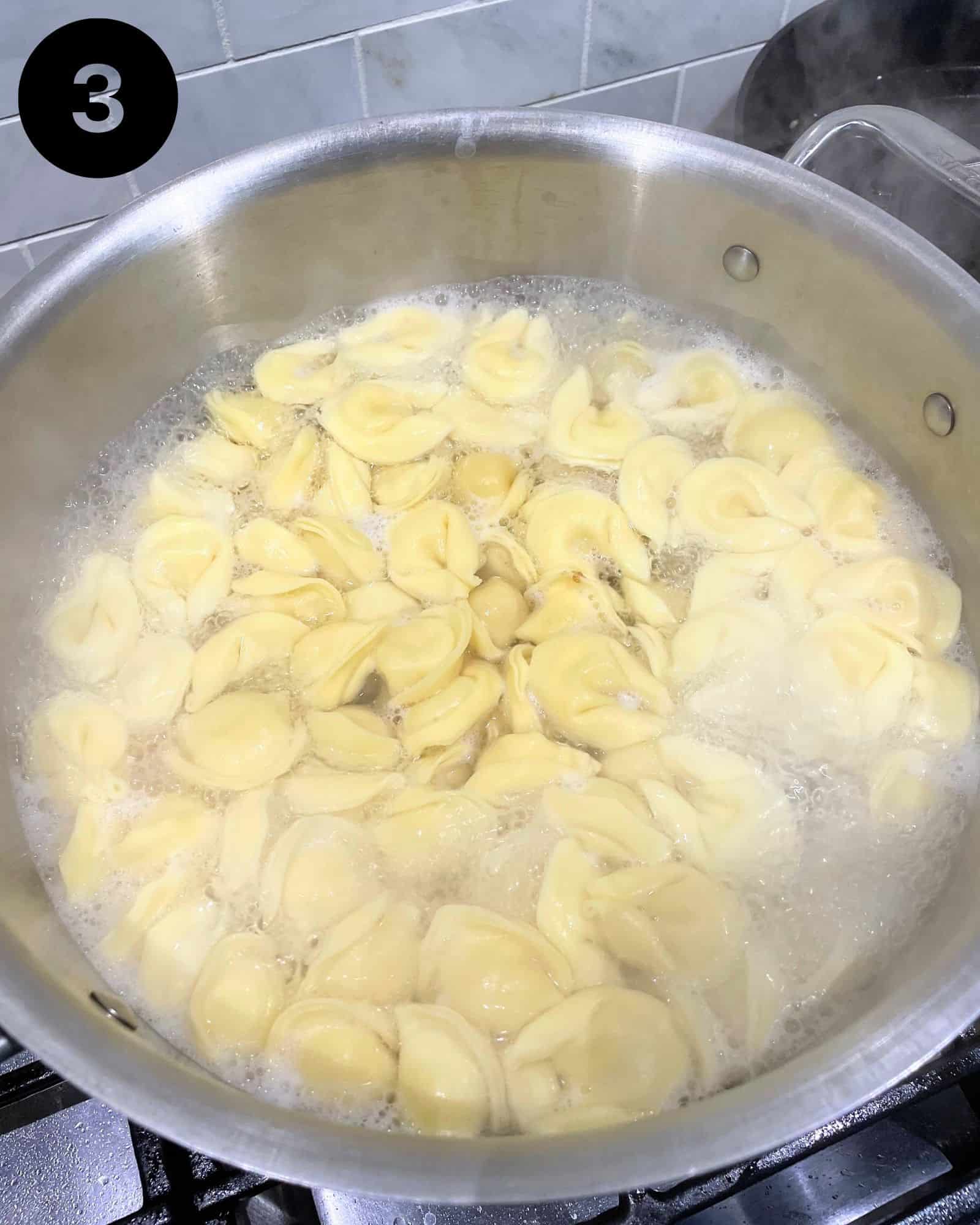 tortelloni pasta in a large pot of salted water.