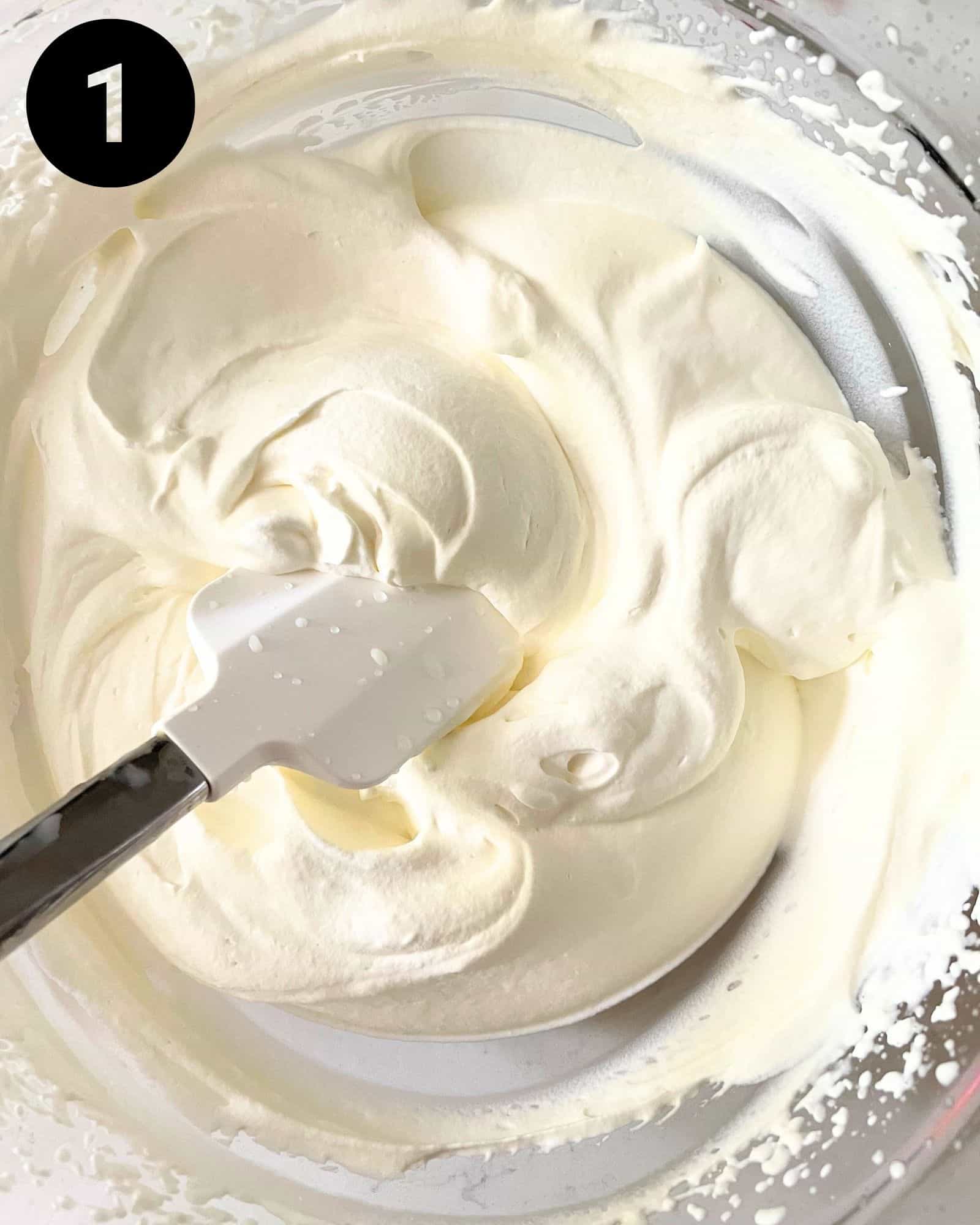 whipped cream in a large mixing bowl.