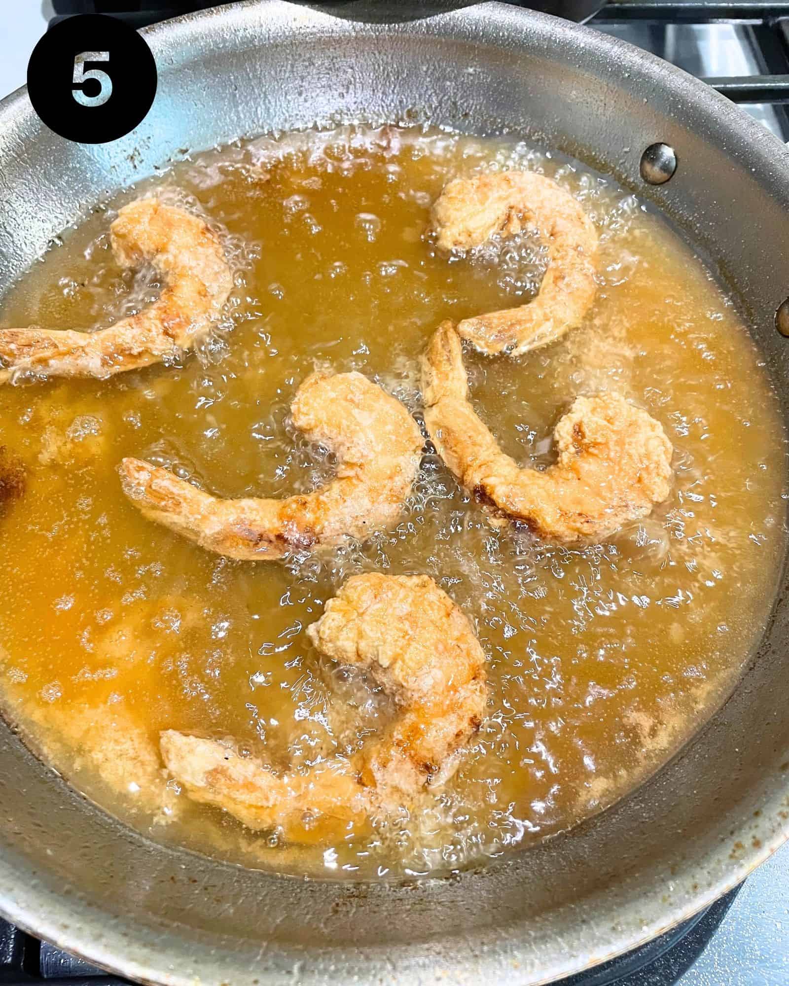 fried shrimp in a skillet.