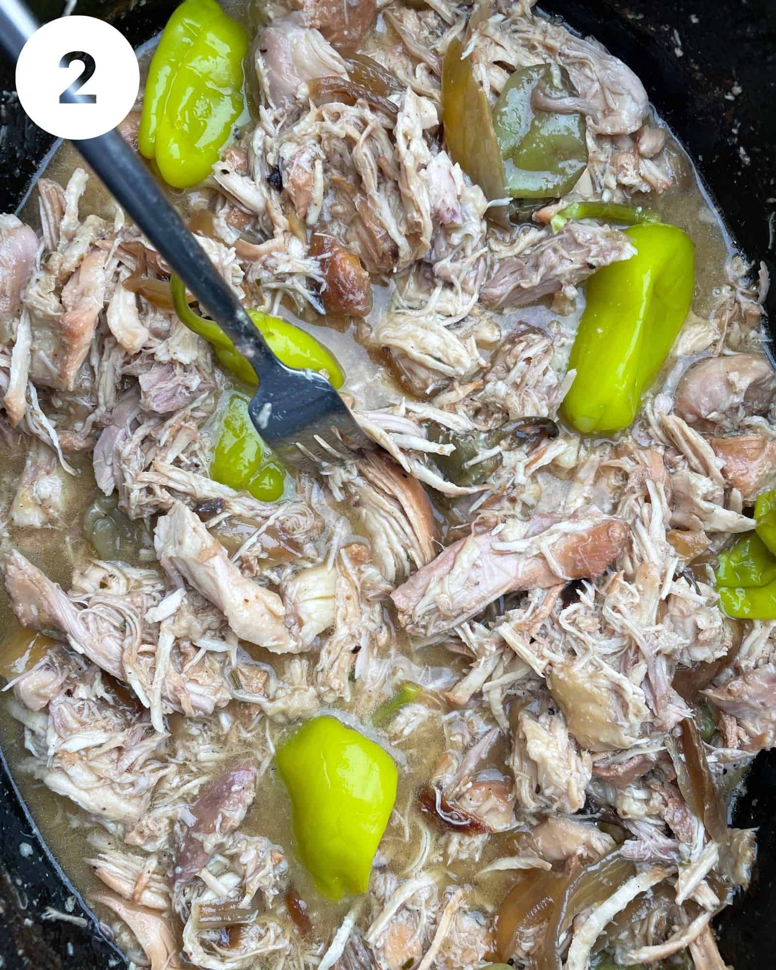 shredded mississippi chicken in a slow cooker.