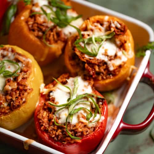 Beef stuffed peppers in a baking dish.