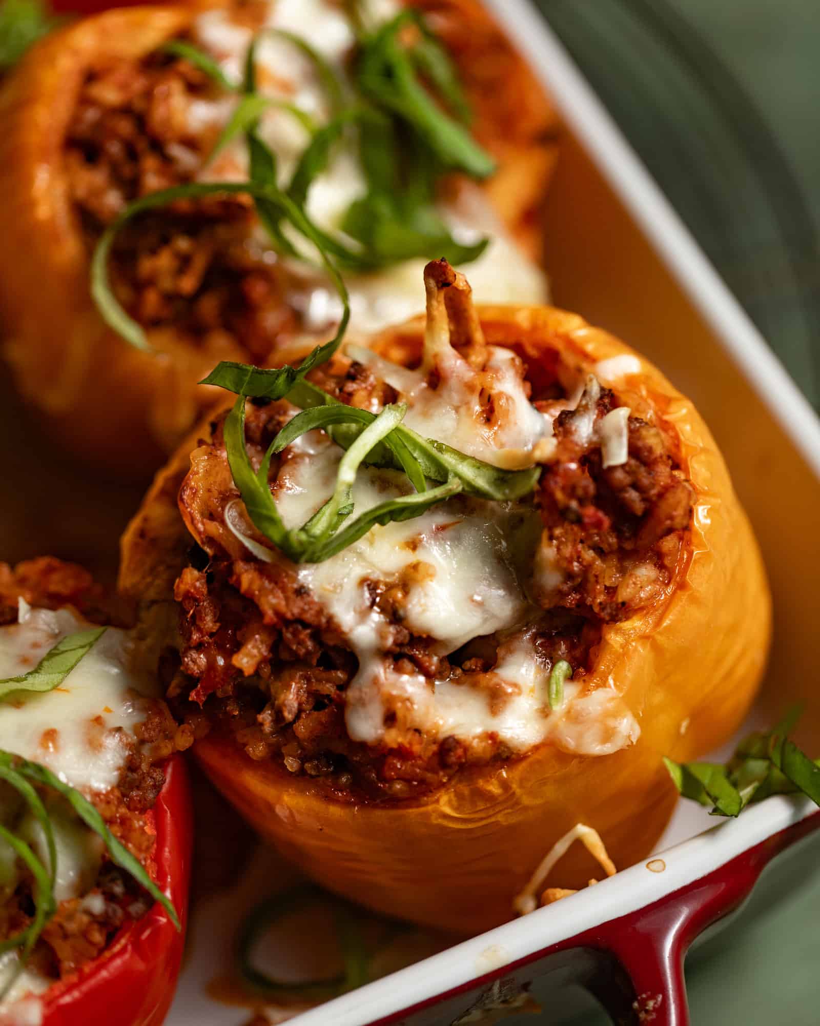 Beef stuffed peppers in a baking dish.