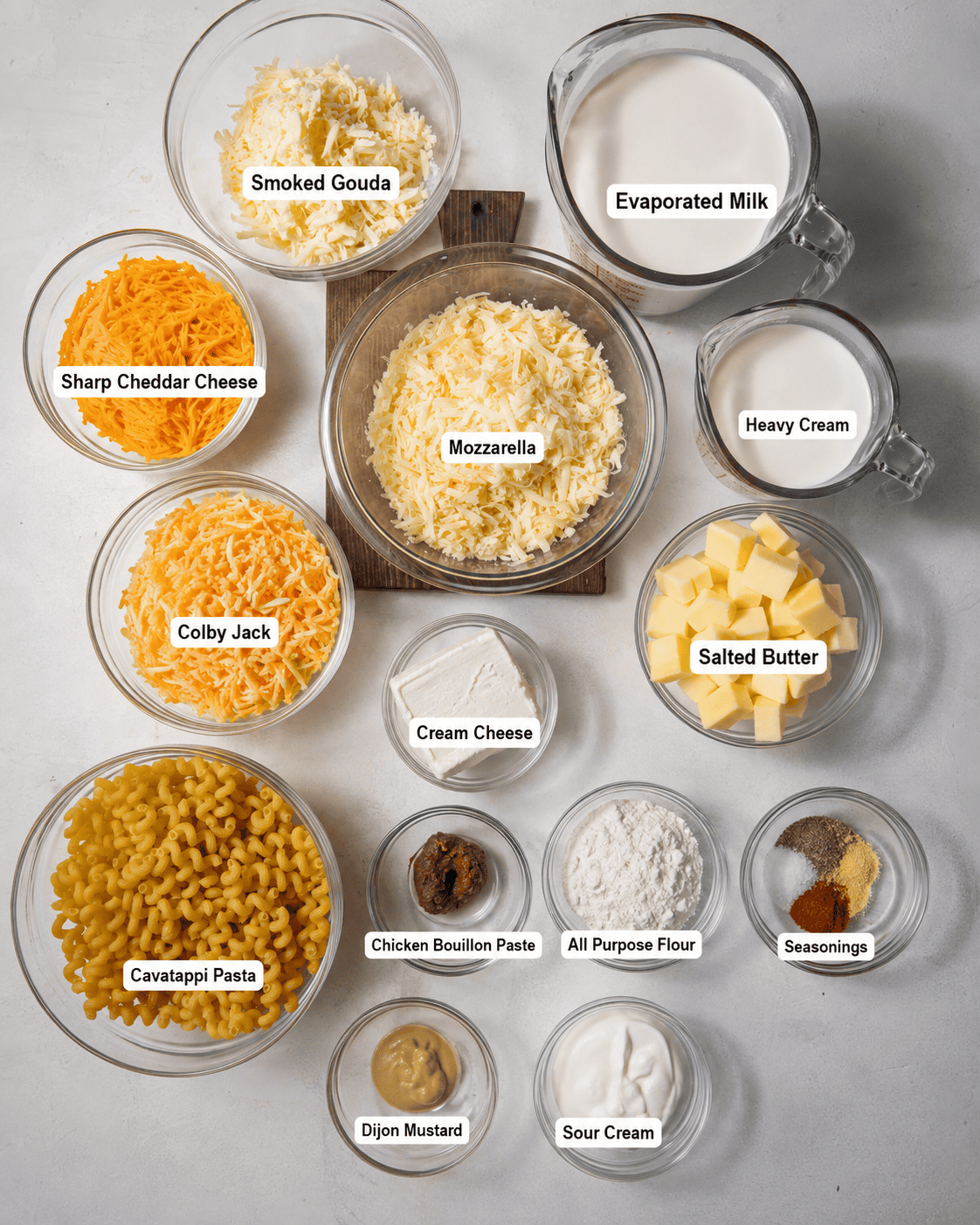 ingredients to make smoked gouda mac and cheese in small bowls.