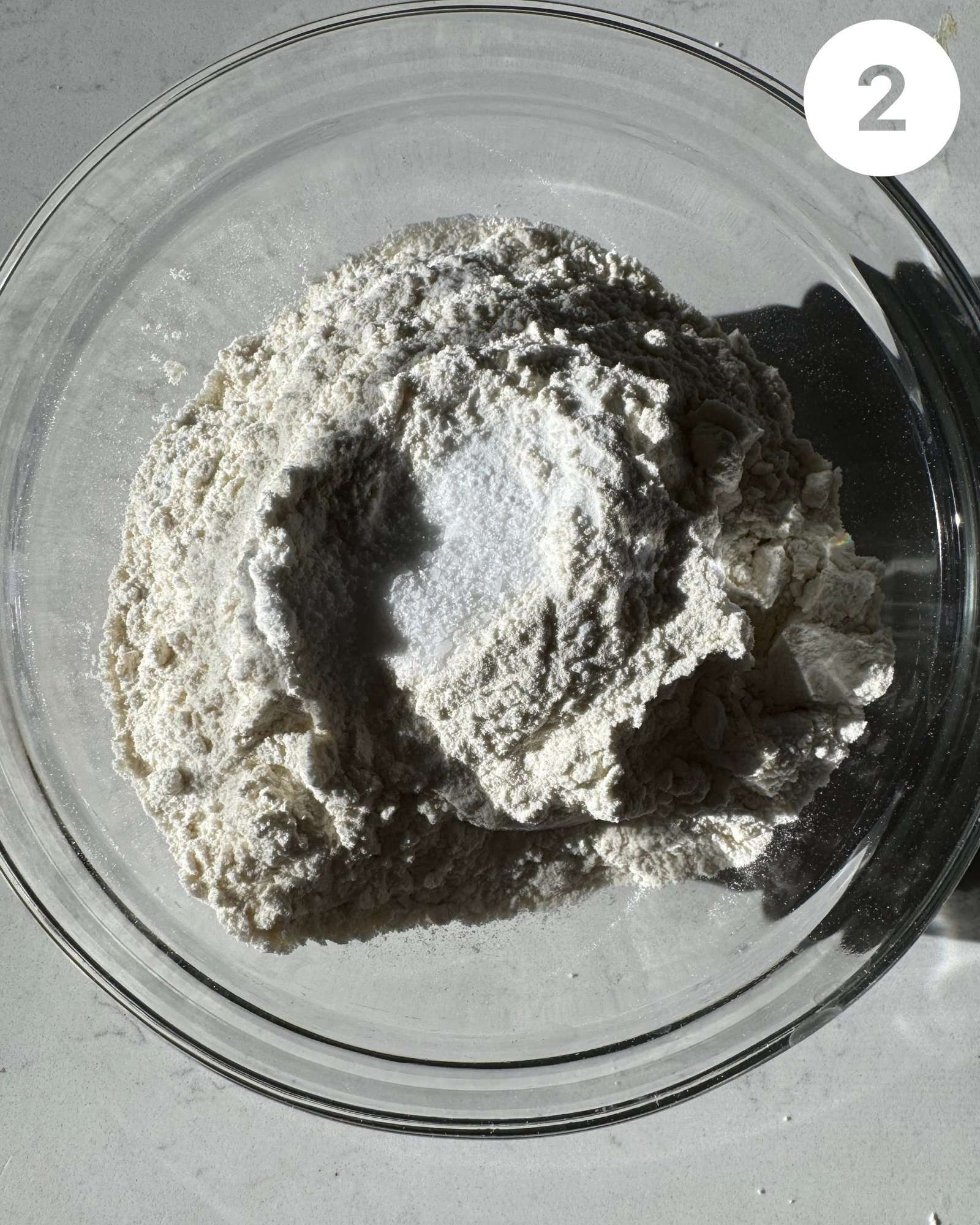 flour, baking soda, and salt mixed together in a mixing bowl