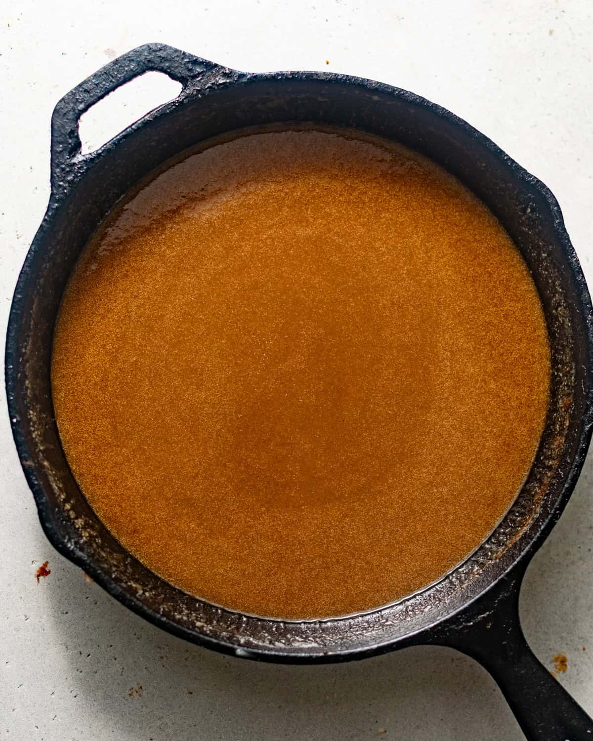 caramel sauce in a skillet.
