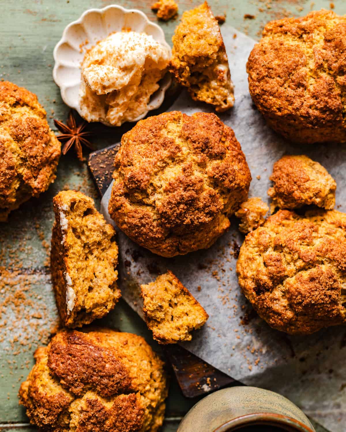 sweet potato biscuits on a cutting board with parchment paper.
