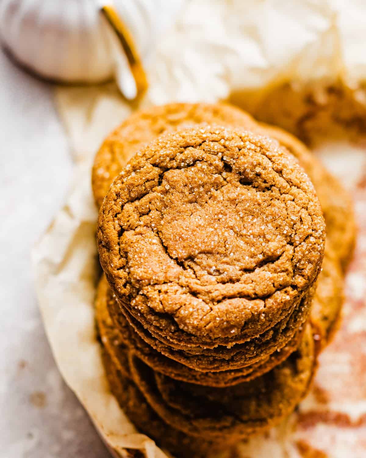 ginger molasses cookies stacked on top of each other.
