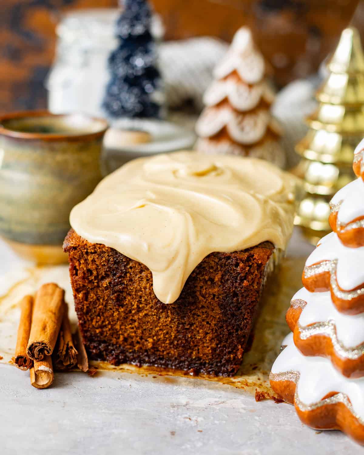 gingerbread loaf topped with molasses cream cheese frosting.