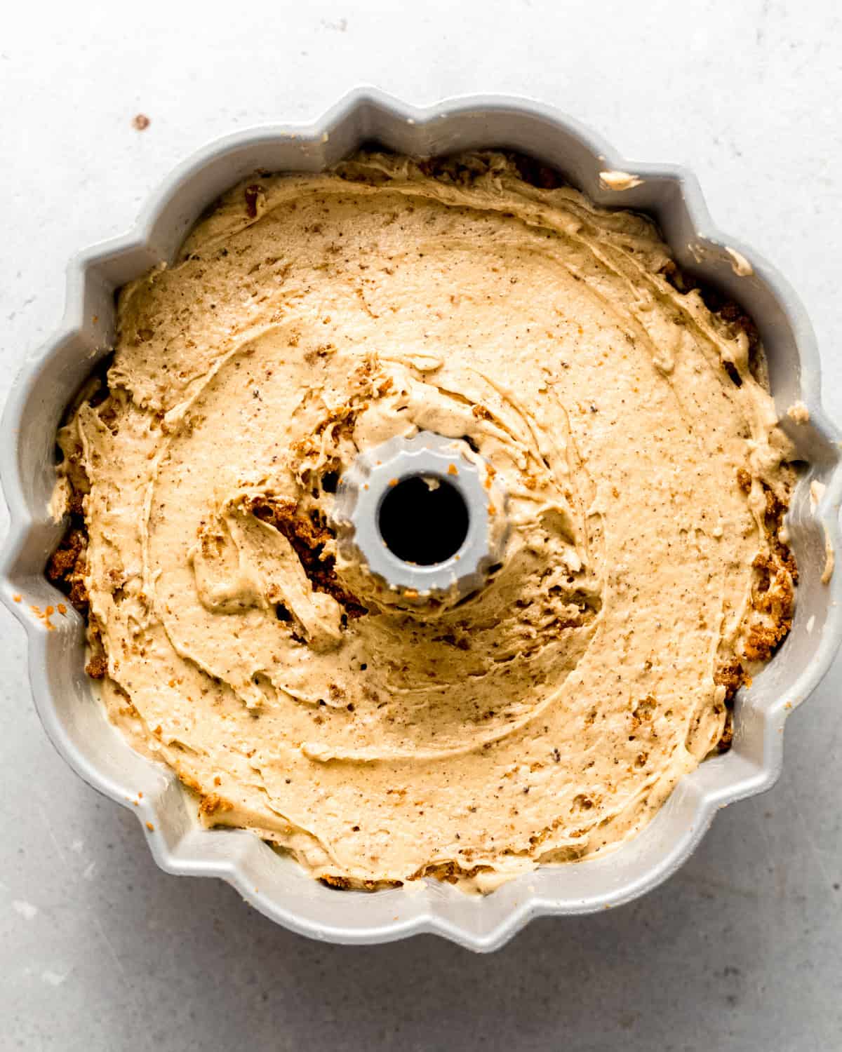 cake batter in a bundt pan.